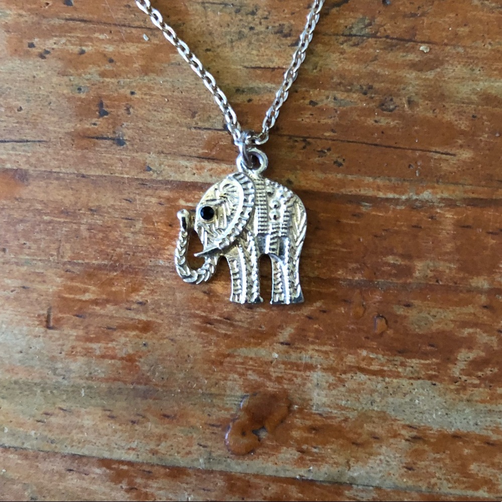 Gold elephant charm necklace